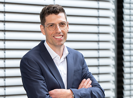 Portraitaufnahme von Herrn Mike Theisen, Außendienstprüfer beim SVRP